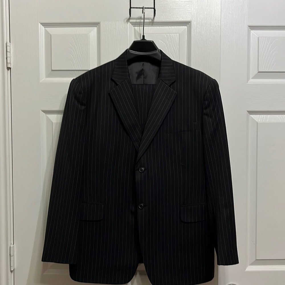 Tailored black pinstripe two-piece men suit. Jacket size 40R/ Pant size 34 waist